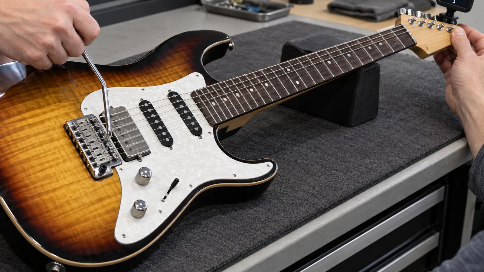 Illustrative electric guitar bridge and tuning stability test